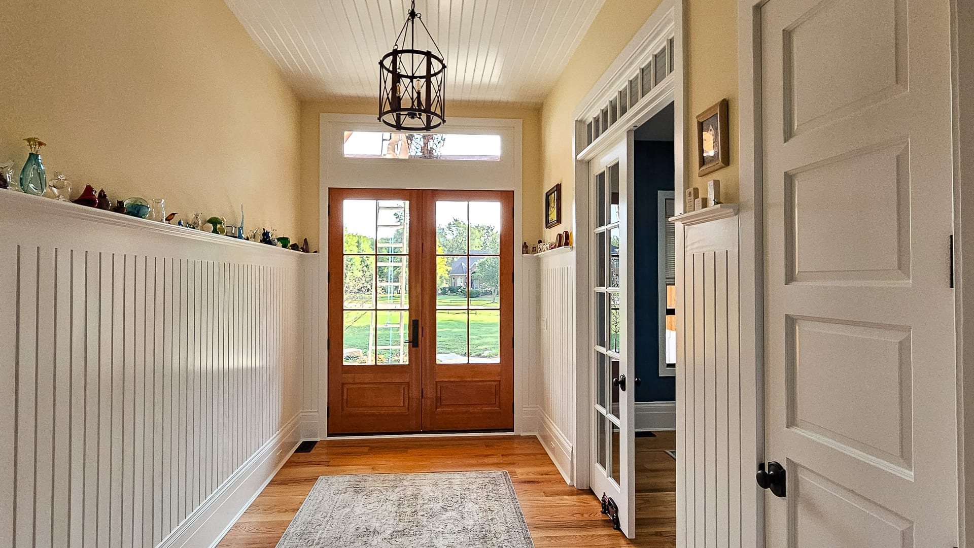 La Grange Beige Hallway Wainscoting Glass Door