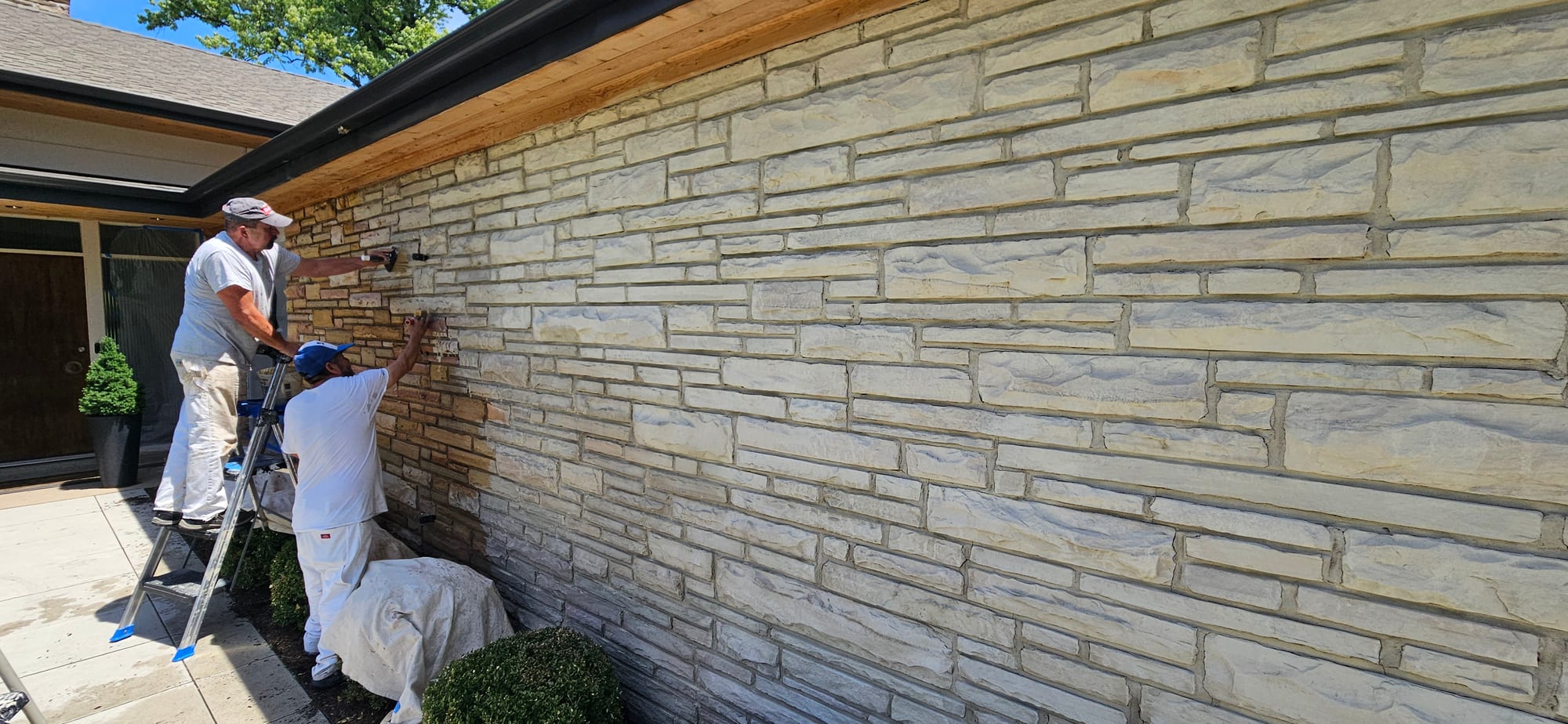 Stone exterior during Lime Slurry application