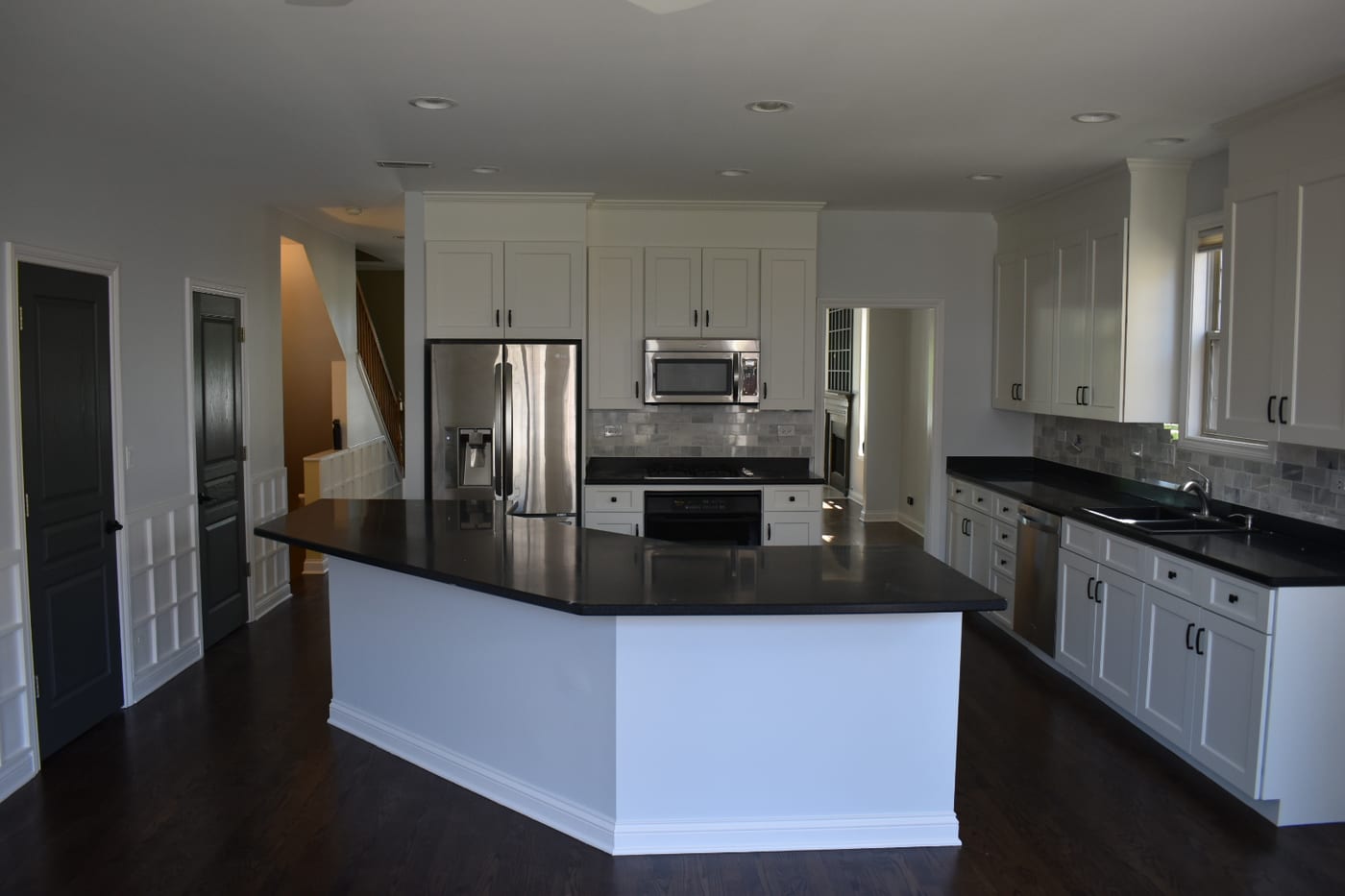 White Kitchen Cabinets Black Countertops Island - Cabinet Painting by Z&Z Painting