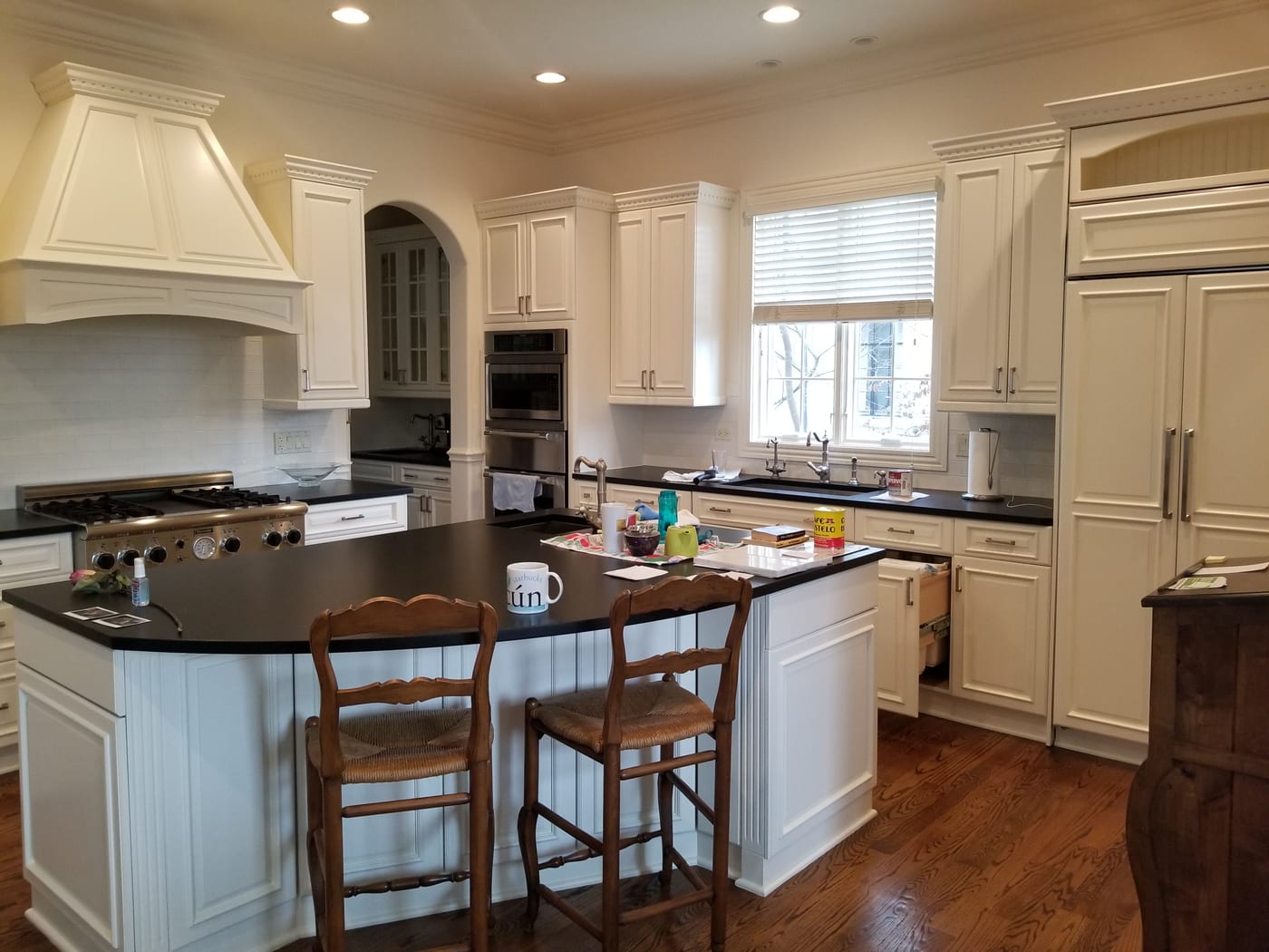 White Kitchen Island Black Countertops Range Hood - Cabinet Painting by Z&Z Painting