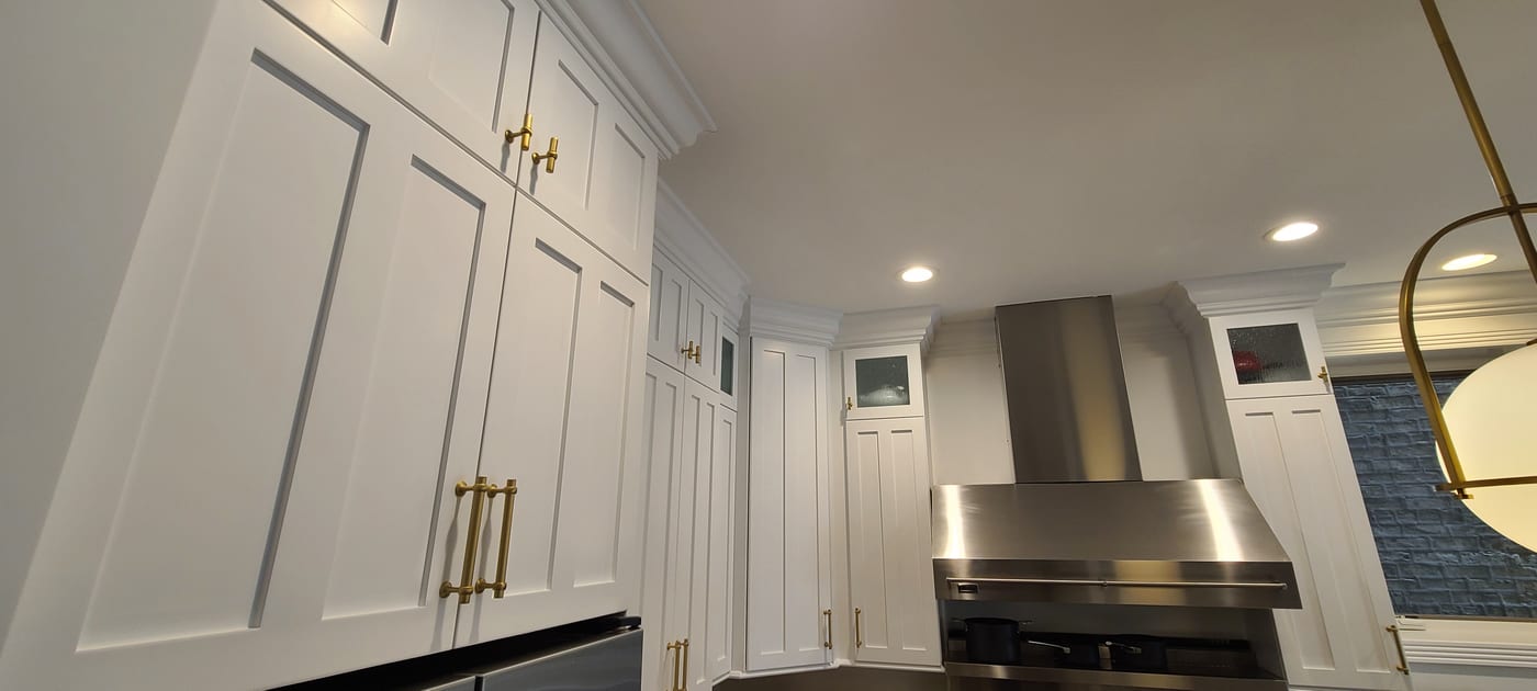 White Painted Upper Cabinets Glass - Cabinet Painting by Z&Z Painting