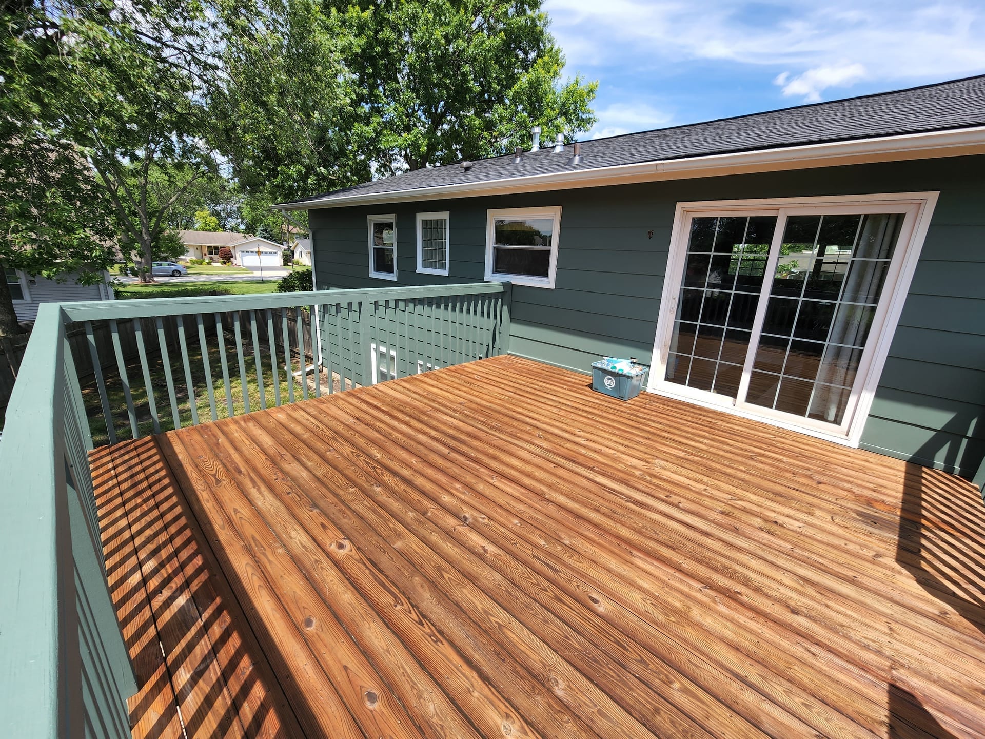 Freshly Stained Deck Outdoor Living Space - Deck Staining by Z&Z Painting