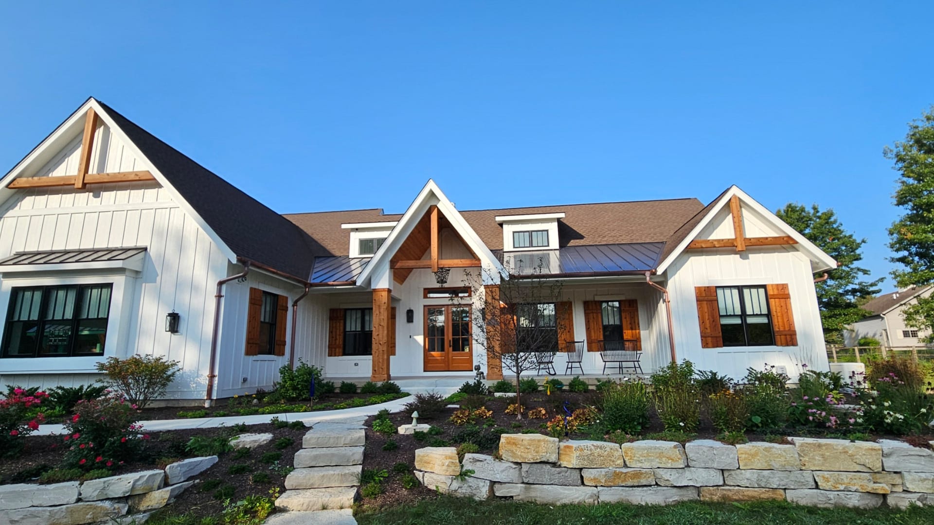 White Home Exterior Brown Shutters Landscaping - Exterior Painting by Z&Z Painting